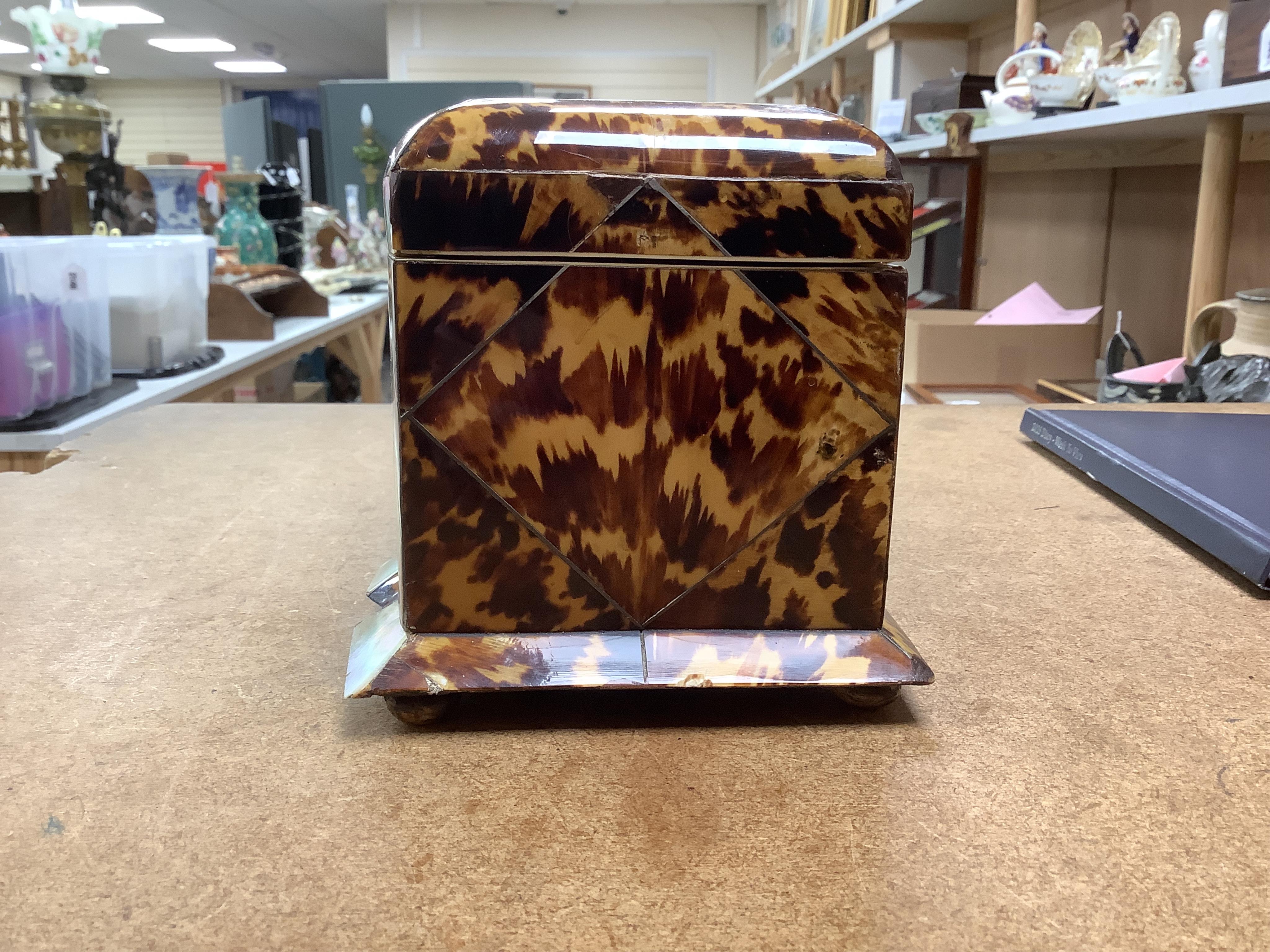 A mid 19th century decorative tortoiseshell and mother of pearl tea caddy, 20cm wide x 12.5cm high CITES Submission reference CXXC25Q1